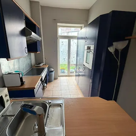 In Quarto em Acomodações Particulares *