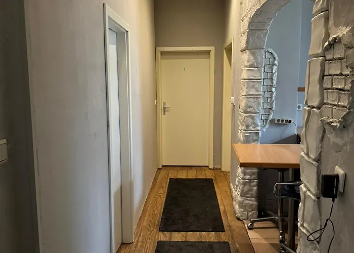 In Quarto em Acomodações Particulares *